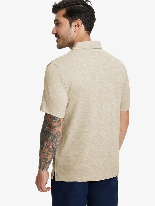 Back half-body view of model in LIGHT KHAKI HEATHER Premium Stretch Heather Polo.