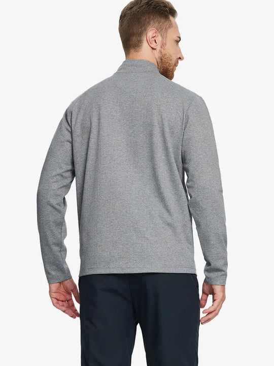 Back half-body view of model in SMOKY GRAY HERRINGBONE Premium Jacquard Quarter Zip Pullover.								
