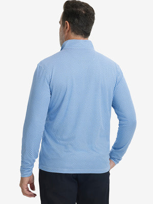Back upper view of model wearing jacquard quarter zip pullover in blue/white, showing clean seam lines.