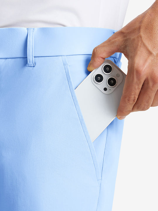 iPhone placed inside pocket of the Light Blue Quick Dry Casual Shorts, showing storage space.