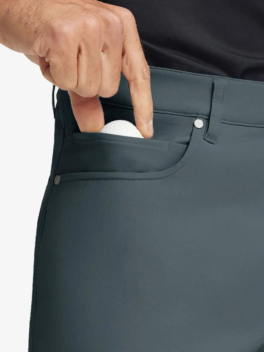 DARK GREY 4-way Stretch Performance Solid Shorts, front pocket holding golf ball detail, 9 Inch