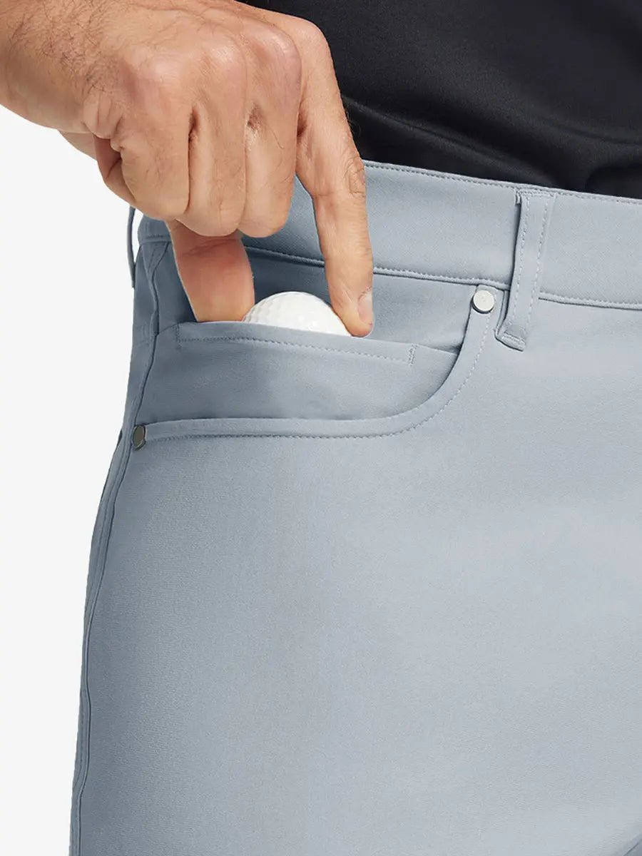 GLACIER GREY 4-way Stretch Performance Solid Shorts, front pocket holding golf ball detail, 9 Inch