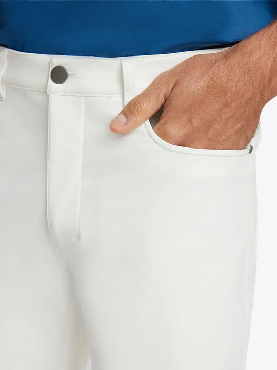 WHITE 4-way Stretch Performance Solid Shorts, front pocket with hand inserted, 9 Inch detail