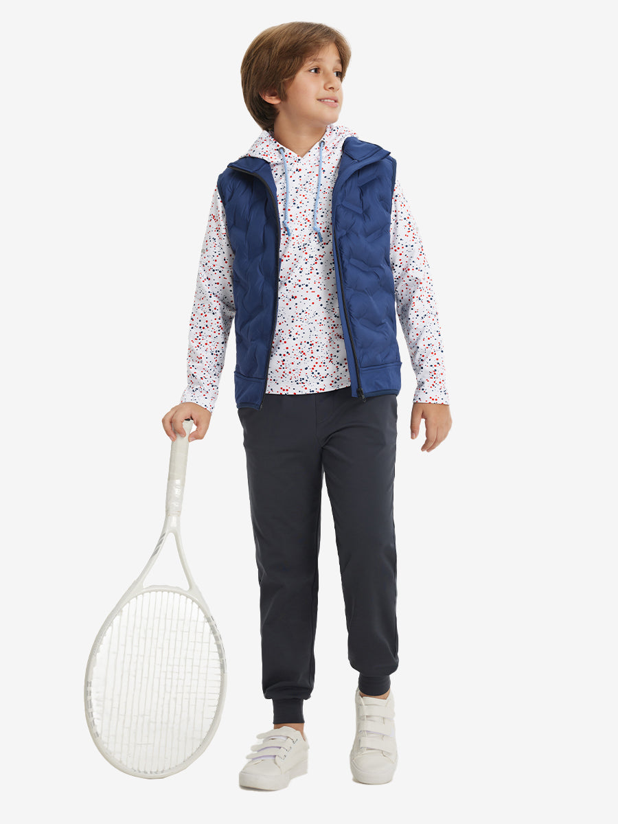 Model posing with golf club in youth full print hoodies pullover, white polka dots.