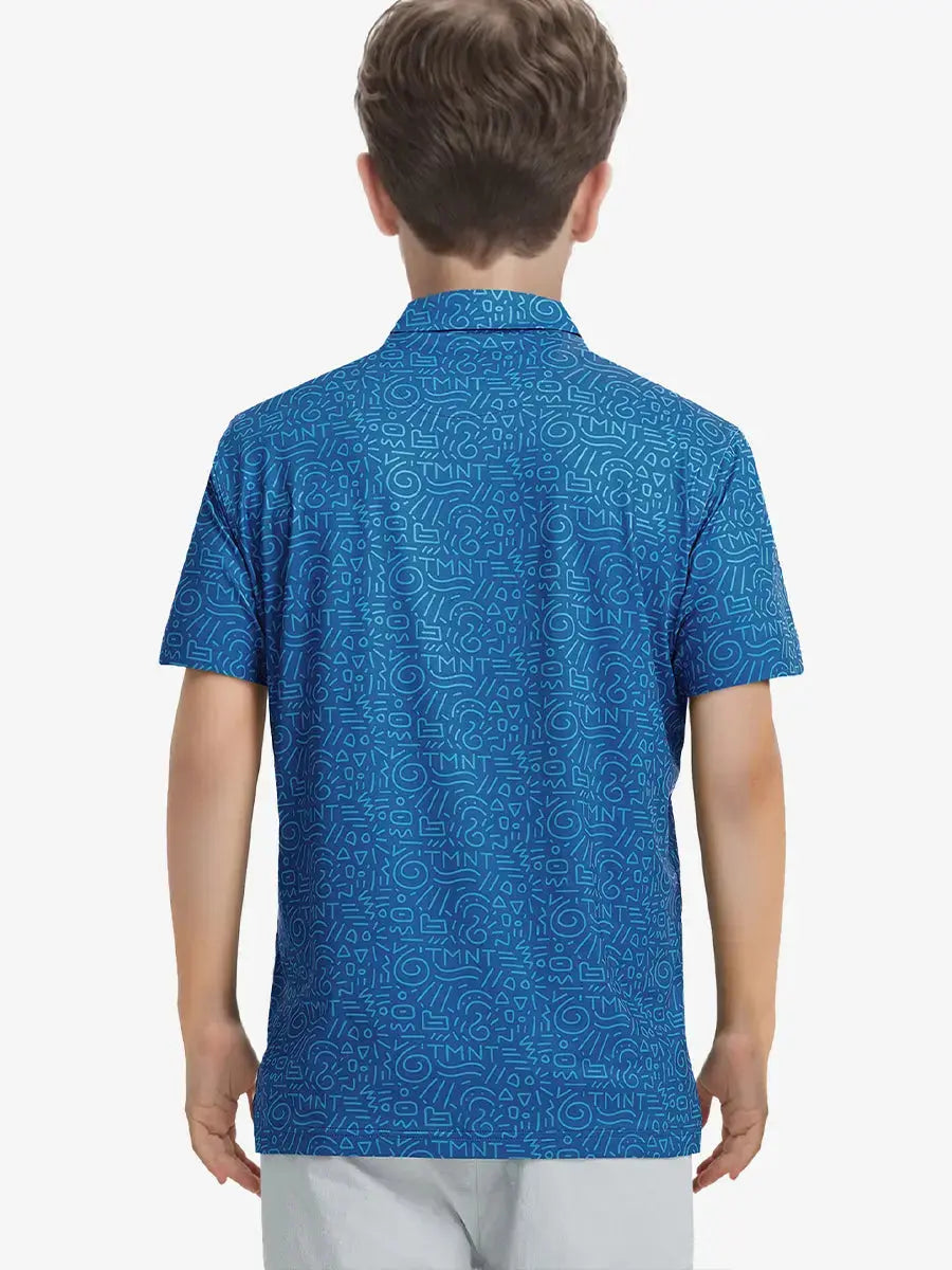 Back half-body view of boy wearing BLUE GRAFFITI Performance Print Boys Golf Polo on the course