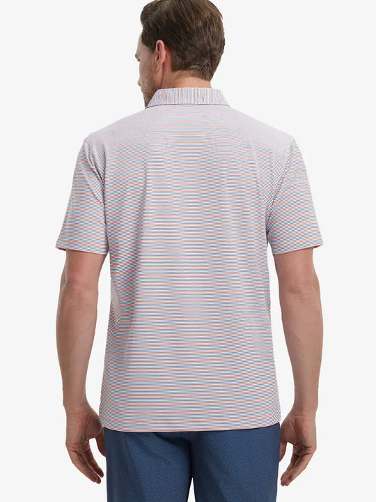 Back view of model in Navy Red Stripe Performance Stripe Golf Shirt