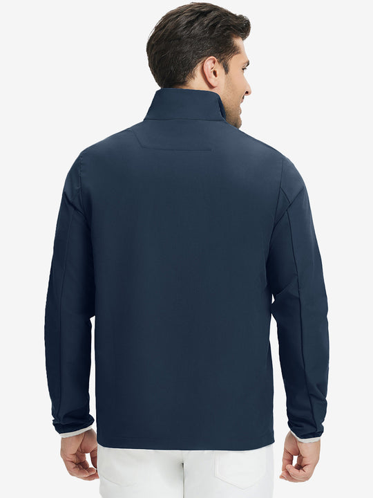 Back upper body view of the navy mock neck golf pullover, model turns head for relaxed pose.
