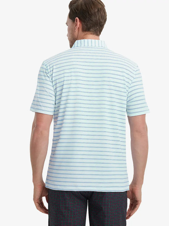 Back view of model in Light Blue Cobalt Stripe Performance Stripe Golf Shirt