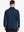 Back half-body view of model wearing NAVY Long Sleeve Solid Jersey Polo