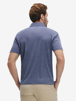 Back waist-up shot of model wearing light dark blue grid ultra-light quick dry moisture wicking collared polo shirt