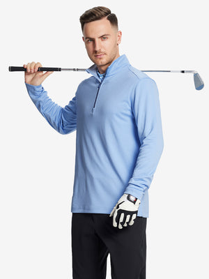 Half-body front shot, model holding golf club in LIGHT BLUE MELANGE Moisture Wicking Quarter Zip Pullover.