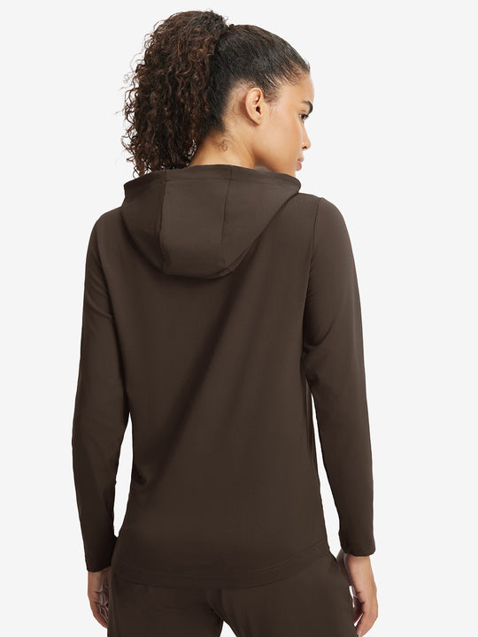Back upper view of model in women's lightweight hoodies pullover, showing relaxed fit in coffee brown.
