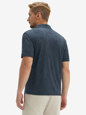 Back waist-up shot of model wearing navy coconut tree breathable jacquard pattern 3-button golf polo