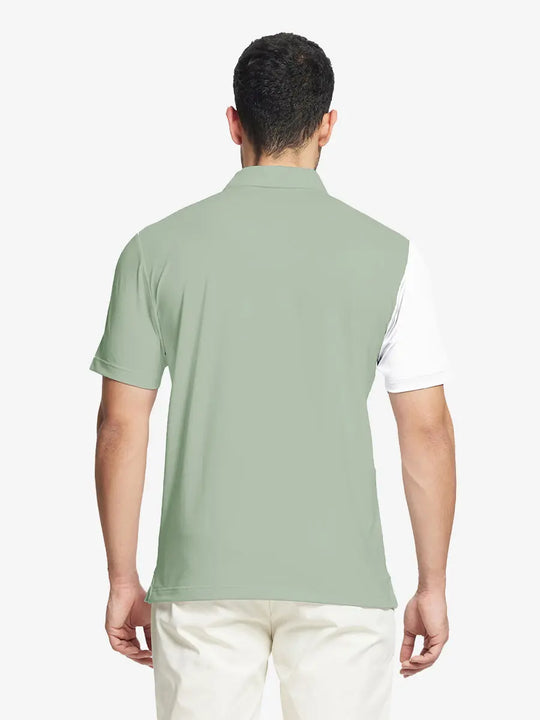 Back half-body view of model in CANARY GREEN Moisture Wicking Color Block Polo Shirt.