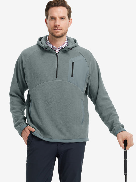 Model holding a golf club, dressed in Smoky Gray Quarter Zip Polar Fleece Sweatshirt, sporty fit.