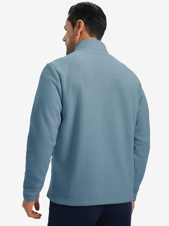Back upper view of model in soft winter fleece jackets, showing shoulder fit and fleece texture in misty blue.