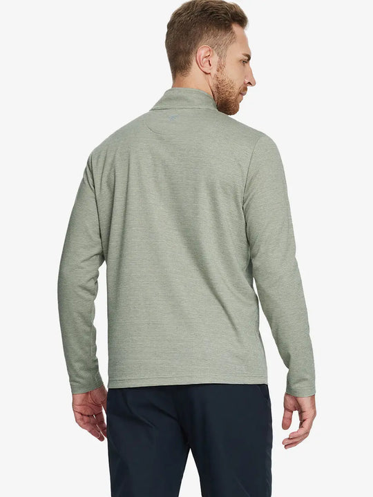 Back half-body view of model in SAGE GREEN HOUNDSTOOTH Premium Jacquard Quarter Zip Pullover.								
