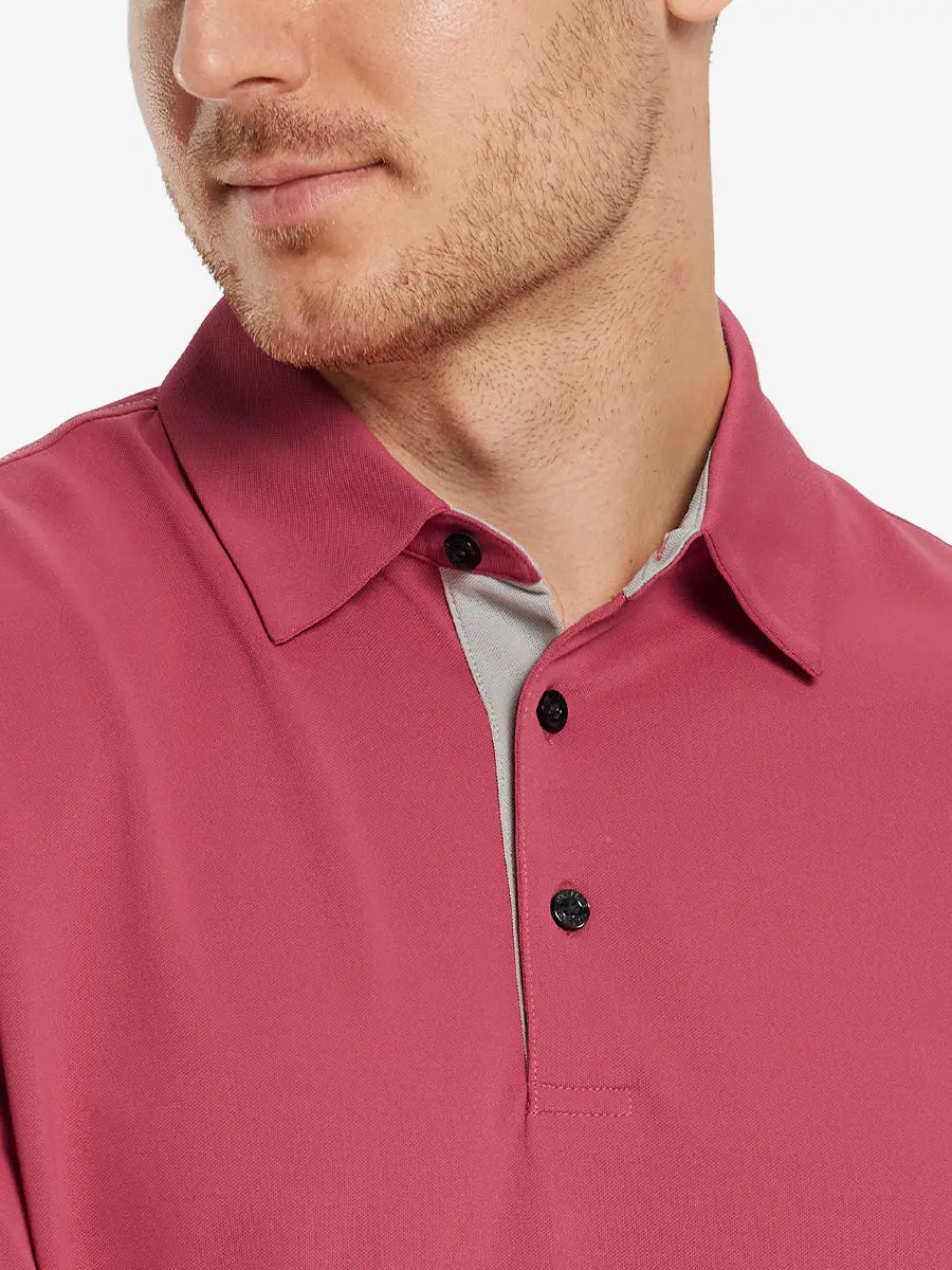 Model front close-up from nose to chest wearing BRICK Ventilated Pique Performance Polo