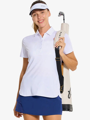 Front half-body of model in WHITE Women's Performance Solid Polo with golf bag