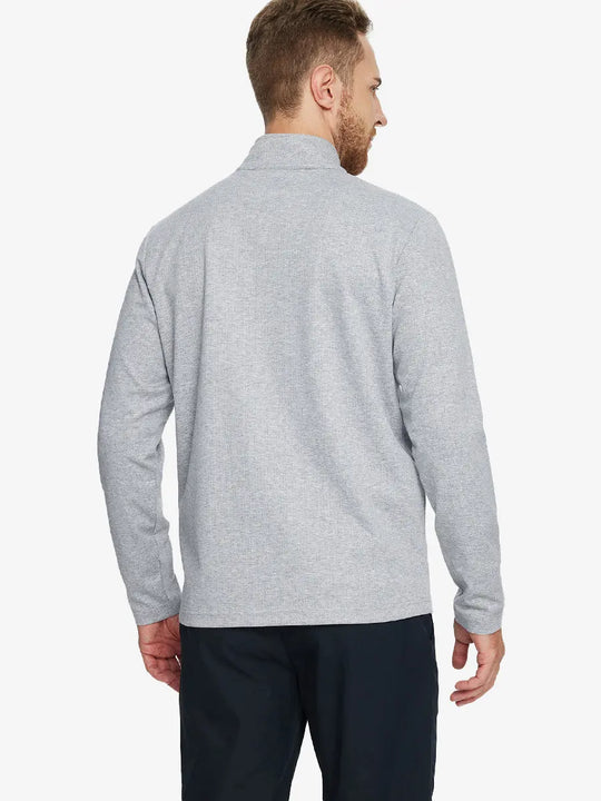 Back half-body view of model in LIGHT GRAY HERRINGBONE Premium Jacquard Quarter Zip Pullover.								
