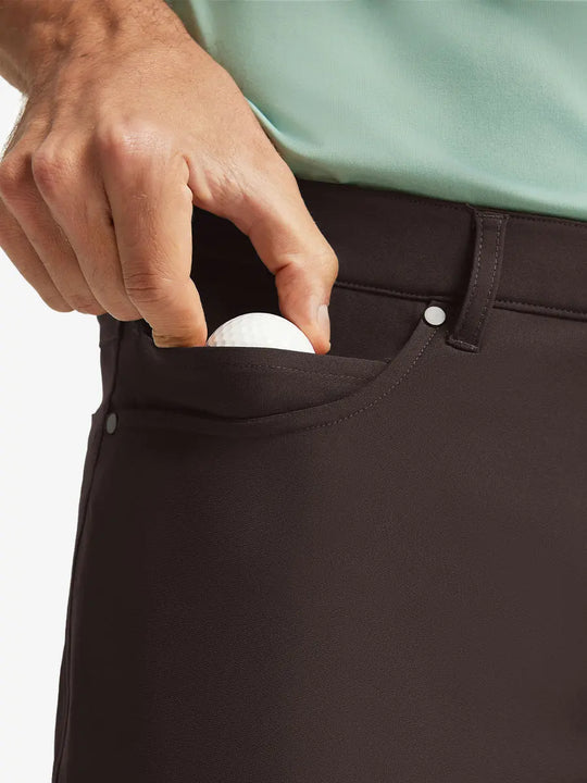 GLACIER GREY 4-way Stretch Performance Solid Shorts, front pocket holding golf ball detail, 9 Inch