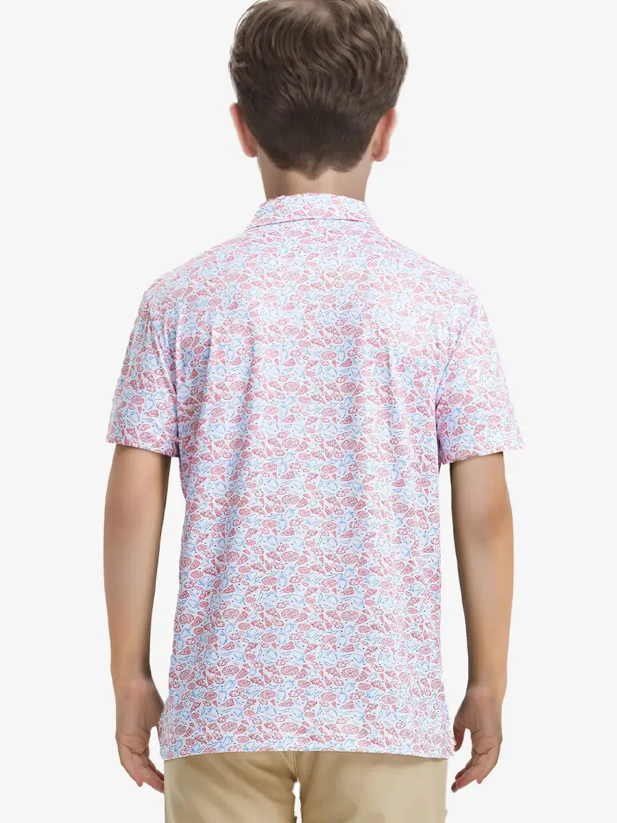 Back half-body view of boy wearing WHITE PIZZA Performance Print Boys Golf Polo outdoors