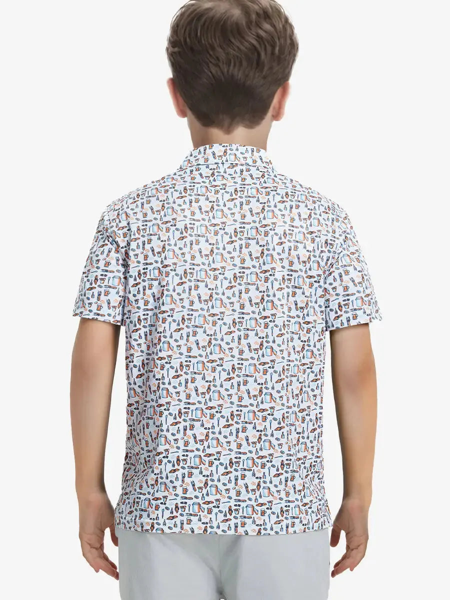 Back half-body view of boy wearing WHITE ORANGE PICNIC Performance Print Boys Golf Polo outdoors