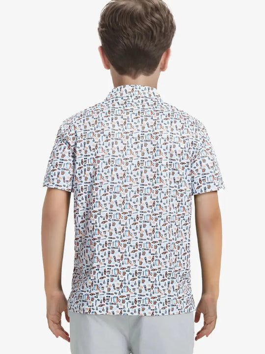 Back half-body view of boy wearing WHITE ORANGE PICNIC Performance Print Boys Golf Polo outdoors