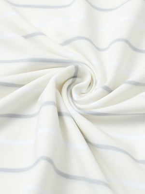 Fabric detail of kids stylish stripe polo shirts, soft striped weave with beige stripe accent