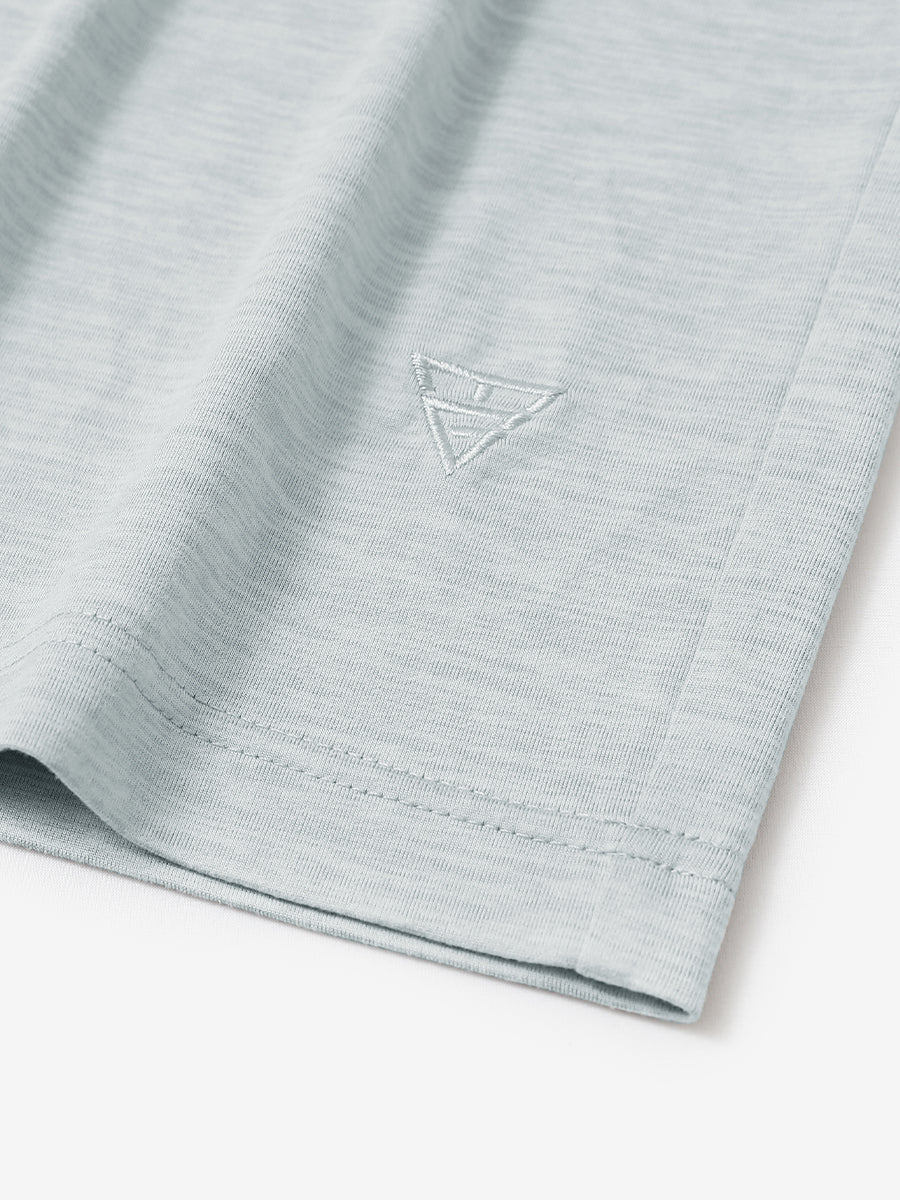 Hem detail of Men’s Long Sleeve Mock Turtleneck Shirt in Light Grey Heather, showcasing smooth finish.