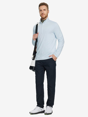 Man wearing Heather Pinstripe Brushed Dry Fit Quarter Zip Pullover in grey mist heather, holding golf club on course