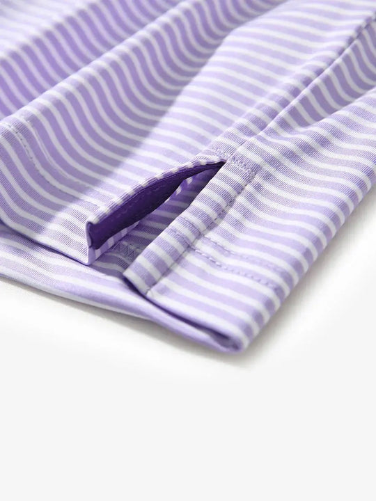 Close-up of hem slit on LAVENDER WHITE STRIPE shirt, tailored detail for stylish performance