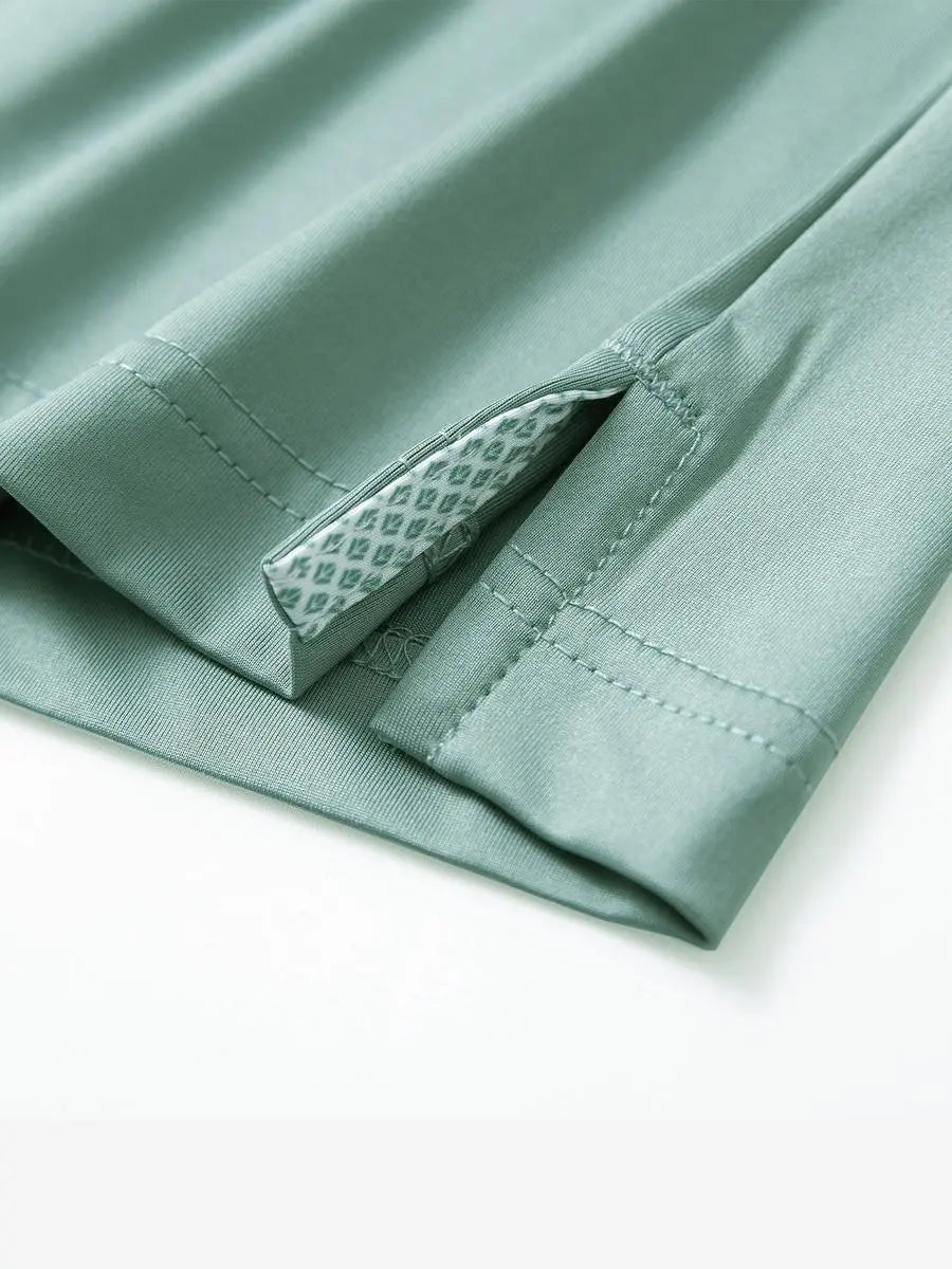 Close-up of side slit detail on the Beryl Green Everyday Classic Solid Polo hem