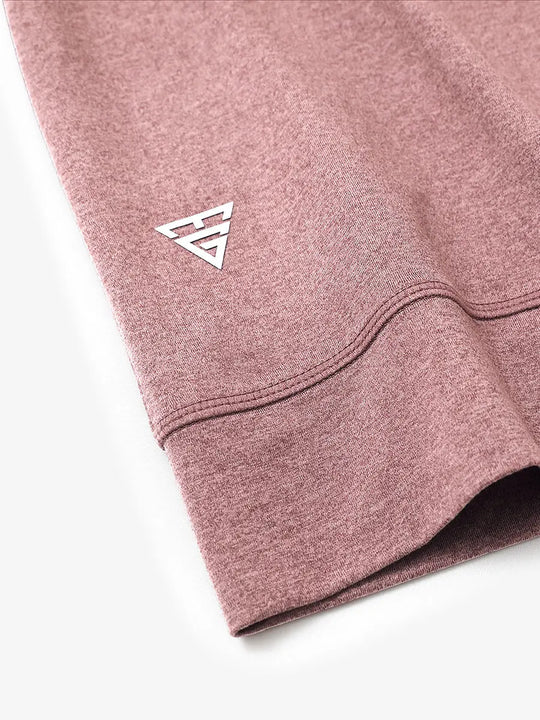 Sleeve cuff logo detail of PINK HEATHER Quarter Zip Melange Pullover, premium design accent.