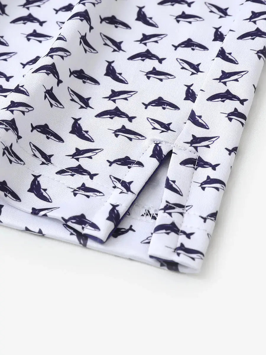 Detailed close-up of side hem slit on WHITE PURPLE SHARK Performance Print Boys Golf Polo for comfort