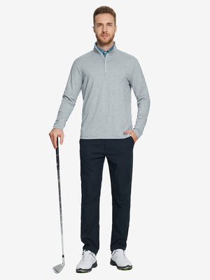 Man wearing Heather Pinstripe Brushed Dry Fit Quarter Zip Pullover in lunar rock melange, holding golf club on course