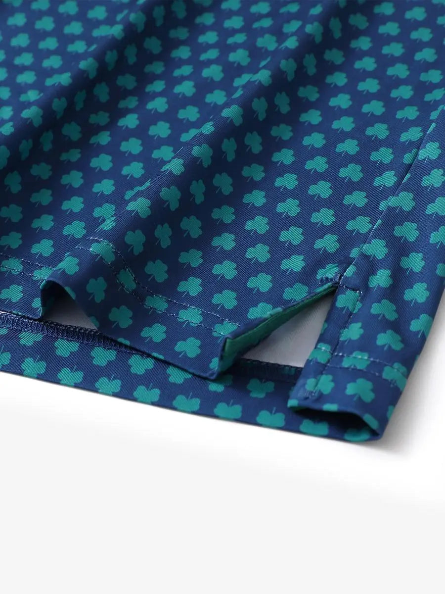 Hem slit detail of MAELREG Performance Jersey Print Polo in Four Leaf Clover – comfort & movement