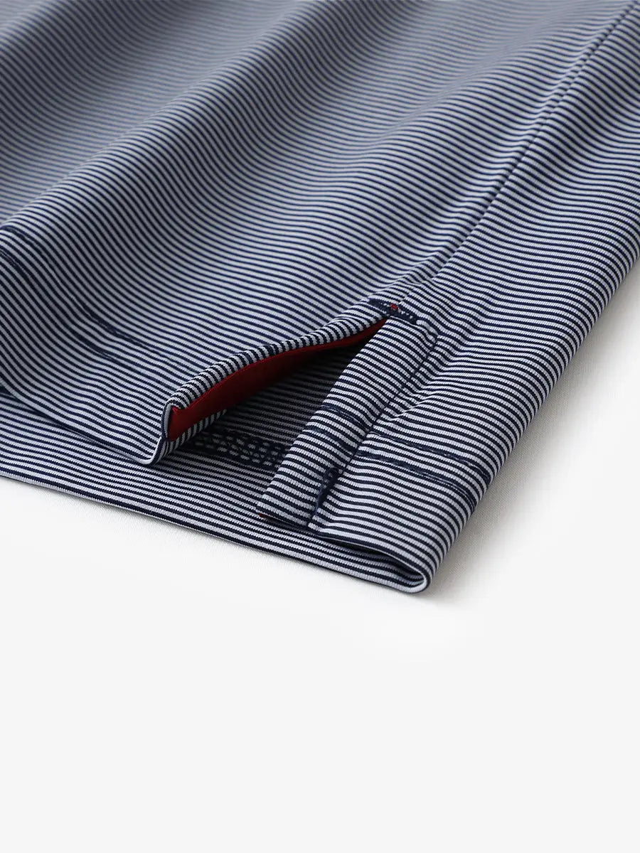 Hem slit detail of NAVY STRIPE Pinstripe Jersey Performance Polo								

