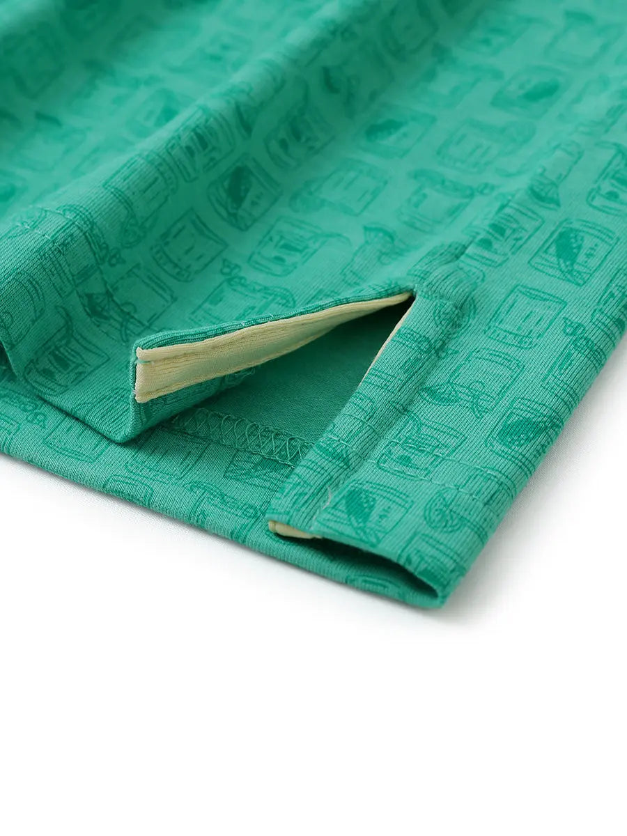 Hem slit detail of GREEN WHISKEY GLASS Popular Heather Print Polo highlighting stitching and finish