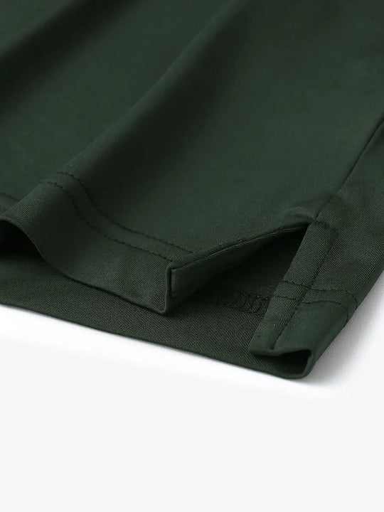 Hem slit detail of Everyday Collarless Jersey Shirt in OLIVE GREEN.