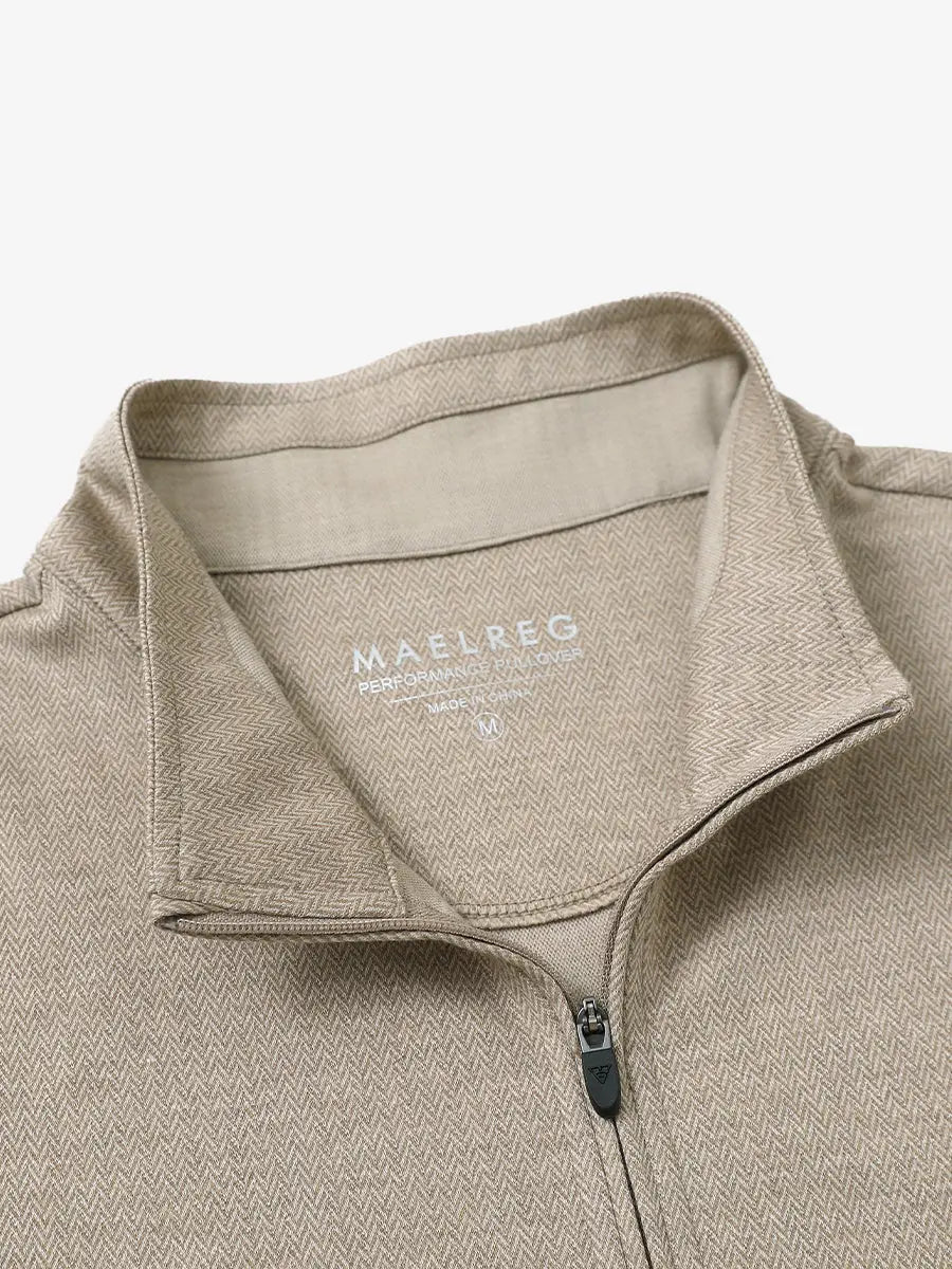 Close-up of collar and interior logo detail on DARK KHAKI HERRINGBONE Premium Jacquard Quarter Zip Pullover.								
