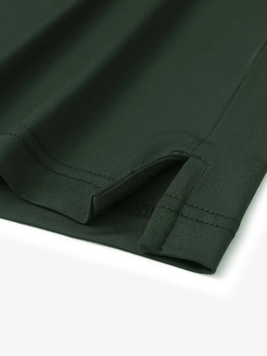 Close-up of hem slit detail on Everyday Solid Jersey Polo in OLIVE GREEN, showing craftsmanship.