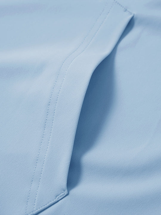 Close-up of single pocket detail on youth long sleeve hoodied with kangaroo pocket in light blue, showing stitching.