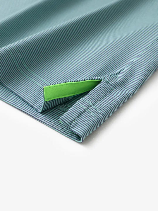 Hem slit detail of GREEN ASH STRIPE Pinstripe Jersey Performance Polo								
