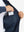 Hand placing iPhone into inner pocket of casual windproof bomber jacket in navy