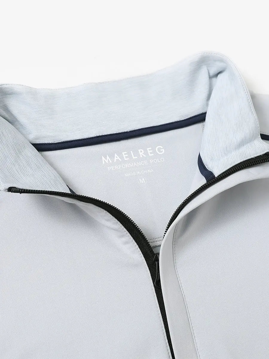 Close-up of collar and interior logo detail on GREY MIST Stretch Solid Fleece Quarter-Zip Vest.								
