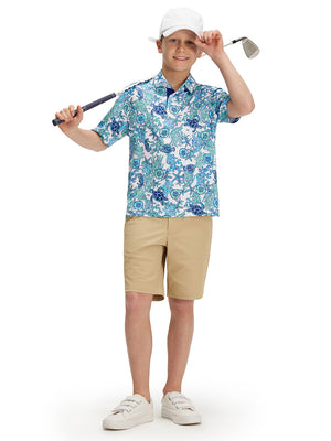 Full front: boy in sea turtle performance print boys golf polo with club on shoulder.