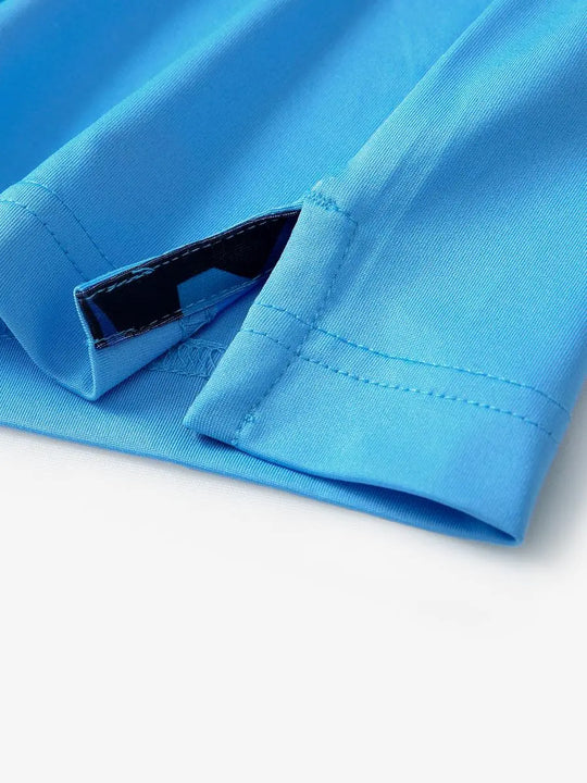 Close-up of side slit detail on the Sky Blue Everyday Classic Solid Polo hem