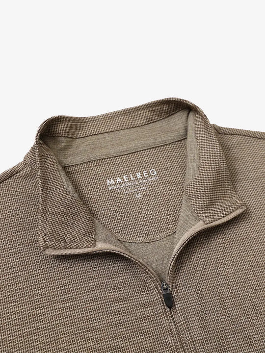 Close-up of collar and interior logo detail on BROWN HOUNDSTOOTH Premium Jacquard Quarter Zip Pullover.								
