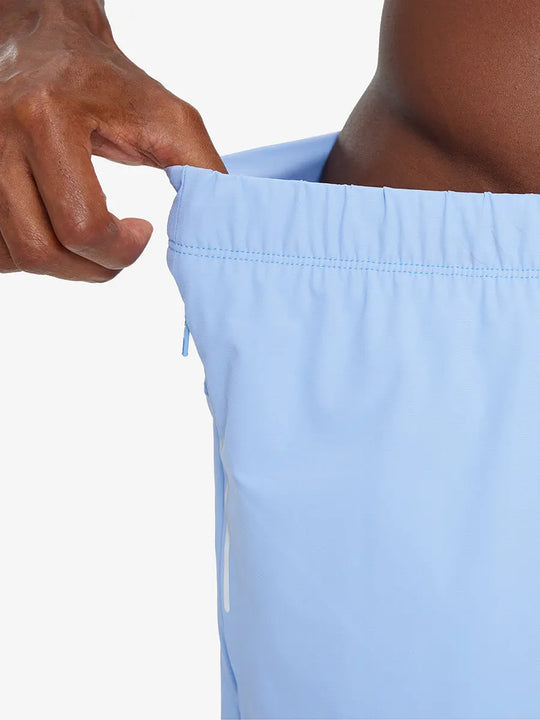 Close-up of waistband stretch showing elasticity of LIGHT BLUE 2 in 1 Running Sports Shorts with Liner